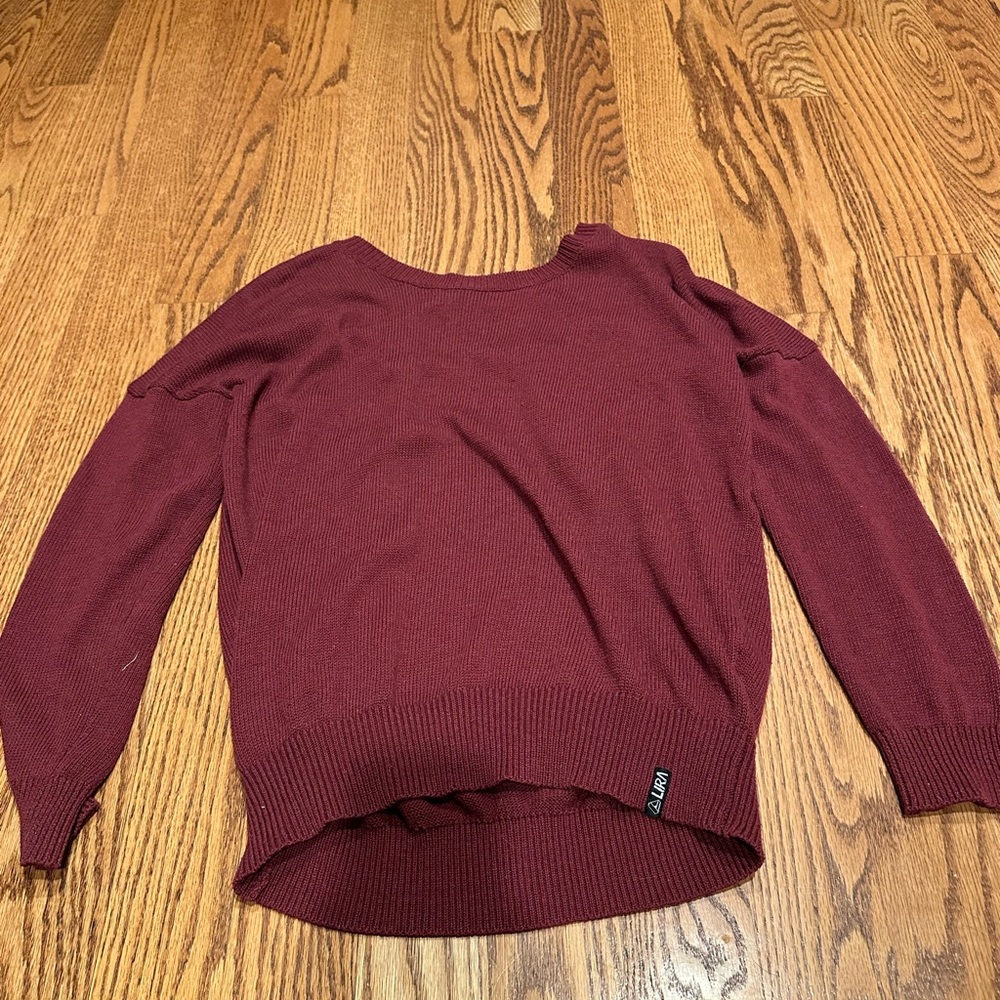 Lira off the shoulder red sweater